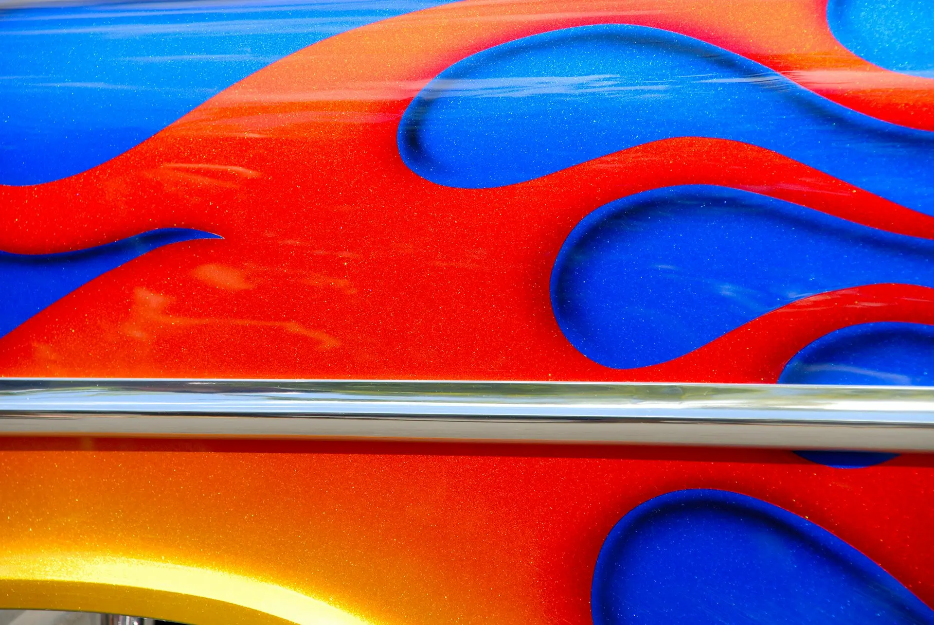 a close up of a red and blue vehicle